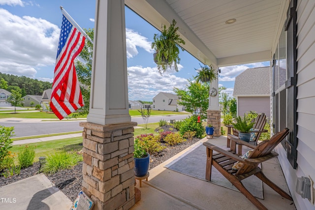 40 Bourne Dr, Franklinton, NC 27525 - covered porch with a residential view
