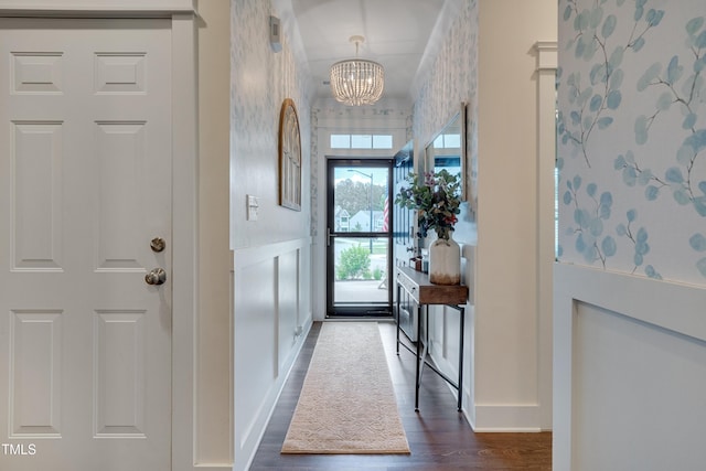40 Bourne Dr, Franklinton, NC 27525 - foyer entrance with a chandelier, dark wood finished floors, and baseboards