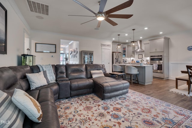 40 Bourne Dr, Franklinton, NC 27525 - living area with a ceiling fan, crown molding, recessed lighting, and wood finished floors