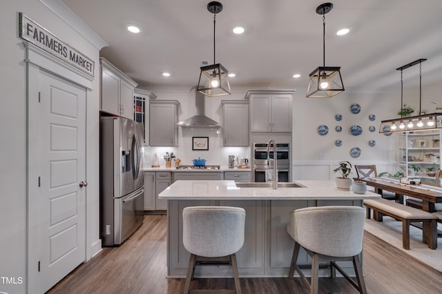 40 Bourne Dr, Franklinton, NC 27525 - kitchen with appliances with stainless steel finishes, gray cabinets, wall chimney range hood, decorative backsplash, and a sink