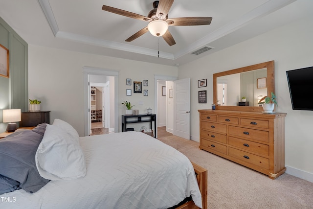 40 Bourne Dr, Franklinton, NC 27525 - bedroom featuring a raised ceiling, light colored carpet, ceiling fan, baseboards, and crown molding