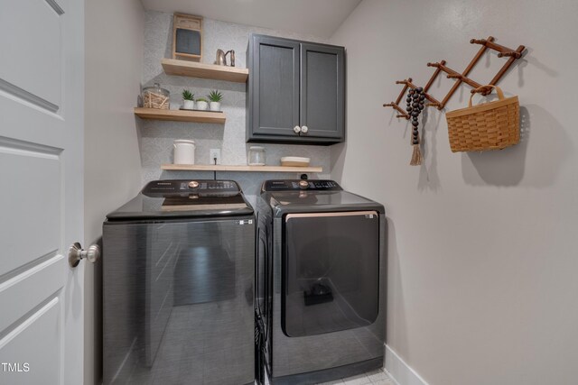 40 Bourne Dr, Franklinton, NC 27525 - washroom featuring cabinet space, washing machine and clothes dryer, and baseboards