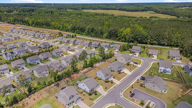 40 Bourne Dr, Franklinton, NC 27525 - aerial overview of property's location with a heavily wooded area and nearby suburban area