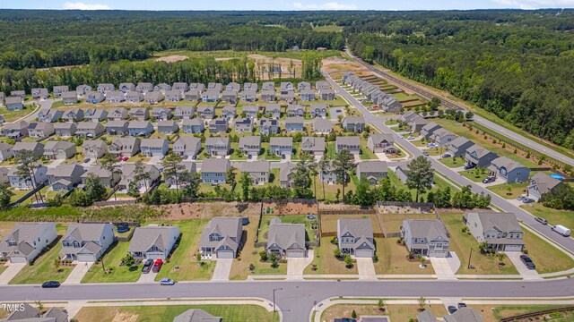 40 Bourne Dr, Franklinton, NC 27525 - view of property location featuring a heavily wooded area and nearby suburban area