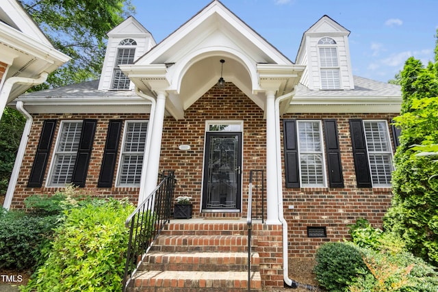 1003 Blackberry Ln, Durham, NC 27712 - entrance to property featuring brick siding and a shingled roof