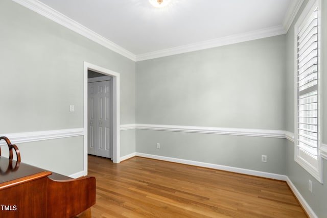 1003 Blackberry Ln, Durham, NC 27712 - unfurnished room featuring healthy amount of natural light, crown molding, and wood finished floors