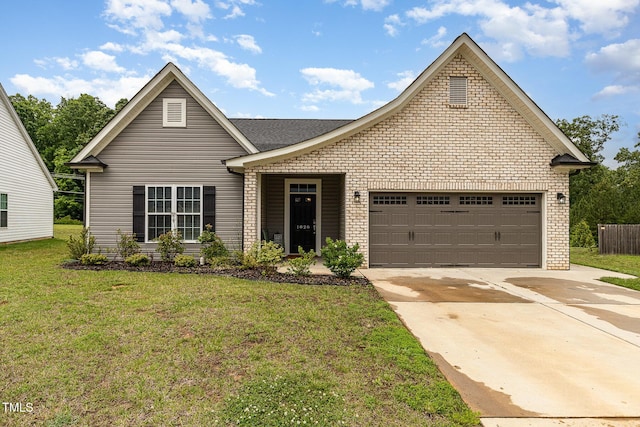 1828 Wellspring Ct, Graham, NC 27253 - view of front of property with brick siding, an attached garage, driveway, and a front lawn