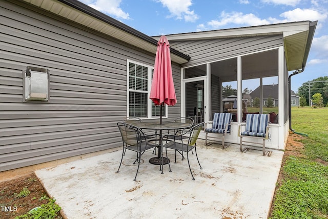 1828 Wellspring Ct, Graham, NC 27253 - view of patio / terrace with a sunroom and outdoor dining area