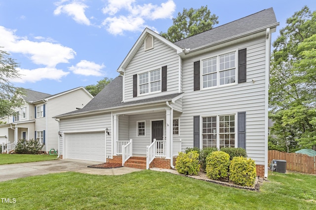 8912 Erinsbrook Dr, Raleigh, NC 27617 - traditional-style home with an attached garage, concrete driveway, roof with shingles, and central AC