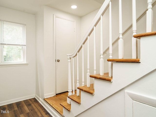 2316 Champion Ct, Raleigh, NC 27606 - stairway with wood finished floors, baseboards, and recessed lighting