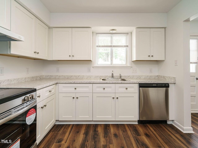 2316 Champion Ct, Raleigh, NC 27606 - kitchen featuring stainless steel appliances, a sink, white cabinets, and dark wood-type flooring