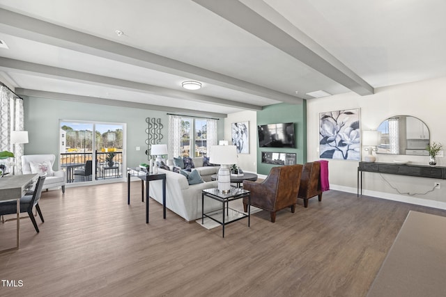 1247 Shaw View Aly Unit 201, Raleigh, NC 27601 - living area with wood finished floors, beamed ceiling, and baseboards