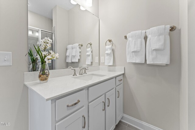 1247 Shaw View Aly Unit 201, Raleigh, NC 27601 - bathroom featuring vanity, tile patterned flooring, and baseboards