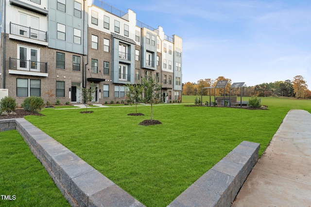 1247 Shaw View Aly Unit 201, Raleigh, NC 27601 - view of property's community with a residential view and a lawn