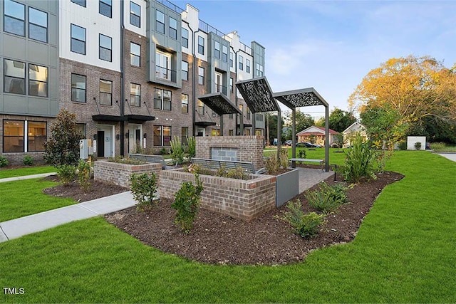 1247 Shaw View Aly Unit 201, Raleigh, NC 27601 - view of property's community with a lawn and a residential view
