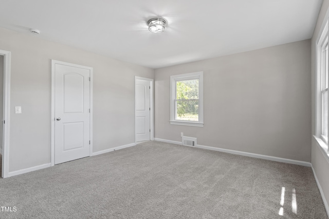 2003 Broadway Rd, Sanford, NC 27332 - unfurnished bedroom featuring carpet floors and baseboards