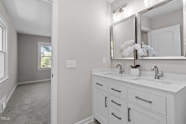 2003 Broadway Rd, Sanford, NC 27332 - bathroom with double vanity and baseboards