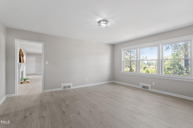 2003 Broadway Rd, Sanford, NC 27332 - empty room with light wood-style flooring and baseboards