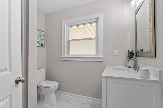 2003 Broadway Rd, Sanford, NC 27332 - bathroom with marble finish flooring, vanity, toilet, and baseboards