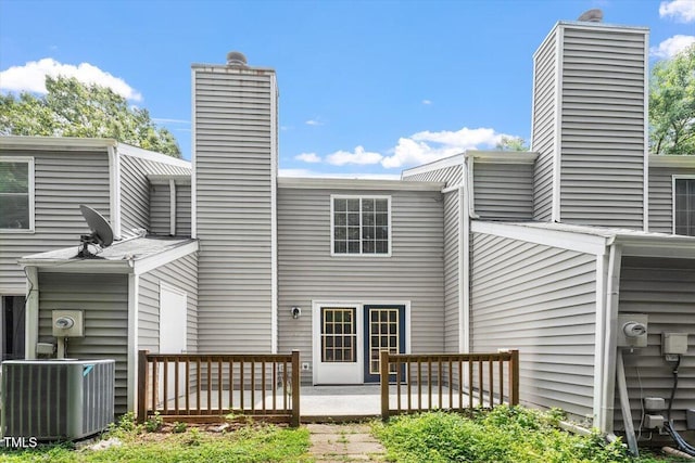 134 Luxon Pl, Cary, NC 27513 - back of property with a chimney and a patio area