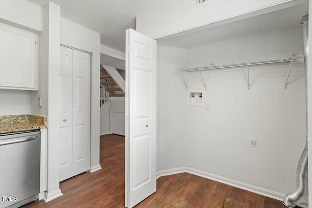 134 Luxon Pl, Cary, NC 27513 - washroom with dark wood-style flooring and washer hookup