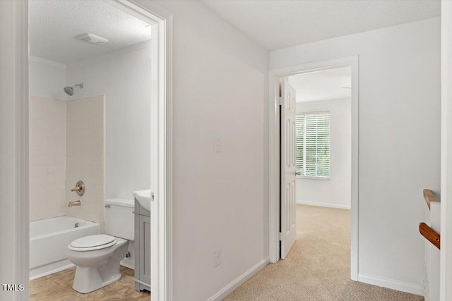 134 Luxon Pl, Cary, NC 27513 - full bathroom featuring vanity,  shower combination, and a textured ceiling