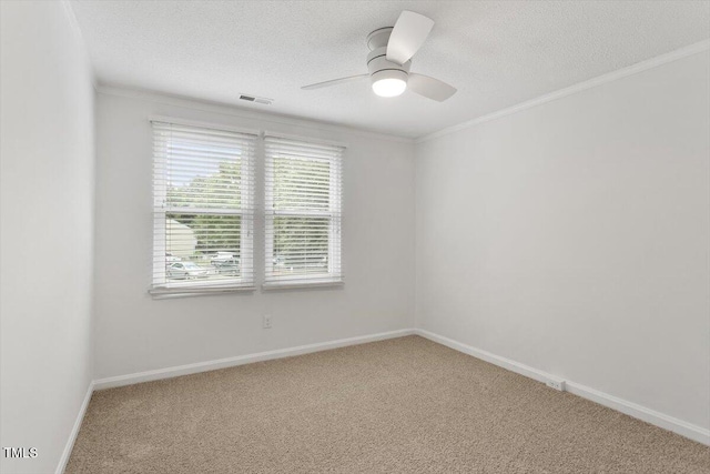 134 Luxon Pl, Cary, NC 27513 - carpeted empty room with a textured ceiling, ornamental molding, and ceiling fan