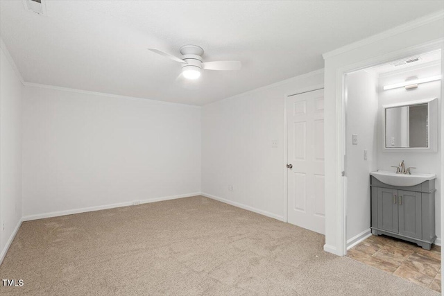 134 Luxon Pl, Cary, NC 27513 - unfurnished bedroom with light colored carpet, ornamental molding, and ceiling fan