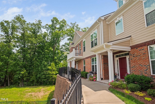 10310 Sablewood Dr Unit 111, Raleigh, NC 27617 - view of property exterior featuring brick siding