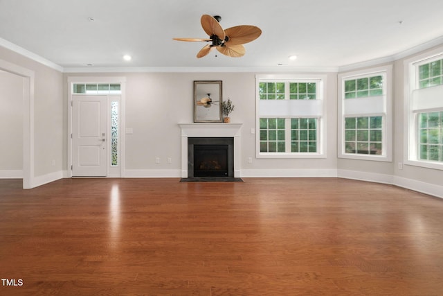 10310 Sablewood Dr Unit 111, Raleigh, NC 27617 - unfurnished living room featuring crown molding, a fireplace with flush hearth, wood finished floors, baseboards, and a ceiling fan