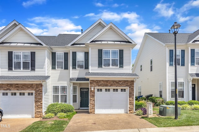 2513 Asher View Ct, Raleigh, NC 27606 - multi unit property featuring stone siding, a standing seam roof, a garage, and asphalt driveway