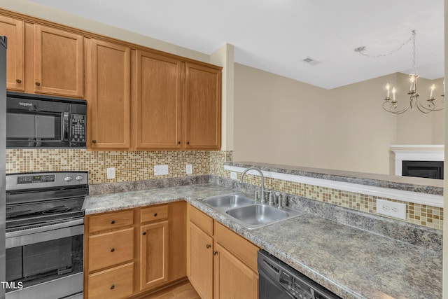2513 Asher View Ct, Raleigh, NC 27606 - kitchen featuring black appliances, a sink, a chandelier, tasteful backsplash, and light countertops