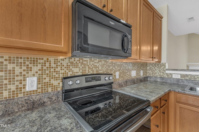 2513 Asher View Ct, Raleigh, NC 27606 - kitchen with black microwave, stainless steel electric stove, tasteful backsplash, and a sink