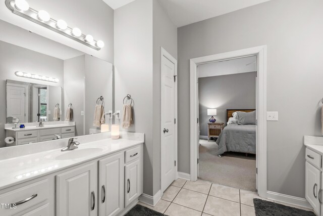 3821 La Costa Way, Raleigh, NC 27610 - full bath featuring vanity, ensuite bathroom, tile patterned flooring, and baseboards