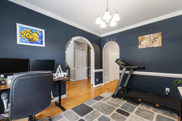 3821 La Costa Way, Raleigh, NC 27610 - office with wood finished floors, arched walkways, a chandelier, ornamental molding, and baseboards