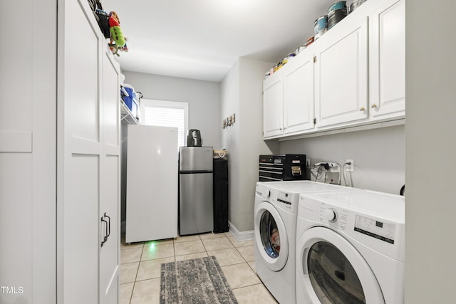 3821 La Costa Way, Raleigh, NC 27610 - laundry room with independent washer and dryer, cabinet space, light tile patterned floors, and baseboards