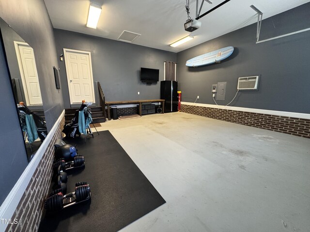 3821 La Costa Way, Raleigh, NC 27610 - exercise room featuring a garage and an AC wall unit