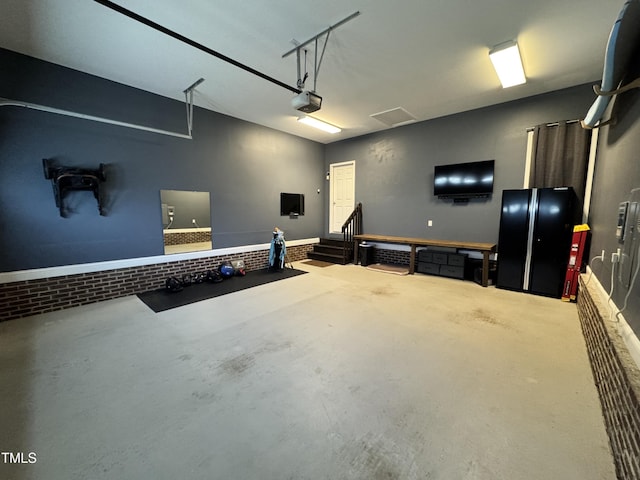 3821 La Costa Way, Raleigh, NC 27610 - garage featuring a garage door opener