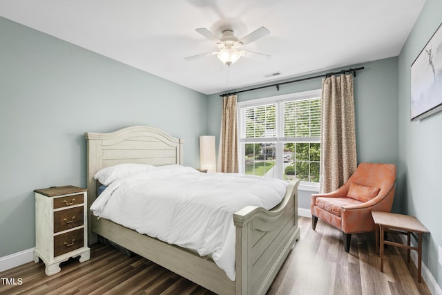 3821 La Costa Way, Raleigh, NC 27610 - bedroom featuring dark wood-type flooring, baseboards, and a ceiling fan