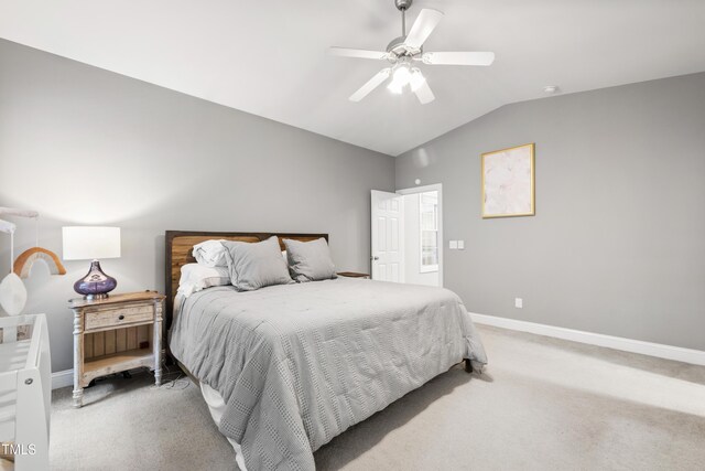 3821 La Costa Way, Raleigh, NC 27610 - bedroom with vaulted ceiling, light colored carpet, baseboards, and ceiling fan