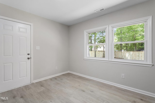 3204 Winfield Ct, Raleigh, NC 27610 - spare room with plenty of natural light, light wood-type flooring, and baseboards