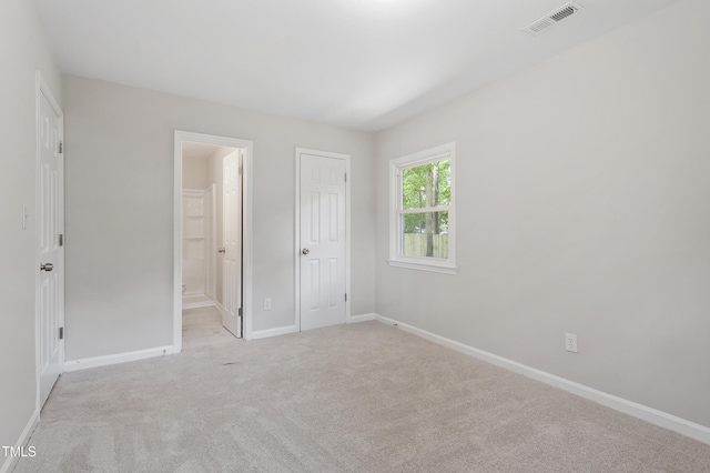 3204 Winfield Ct, Raleigh, NC 27610 - unfurnished bedroom featuring carpet, baseboards, and ensuite bath