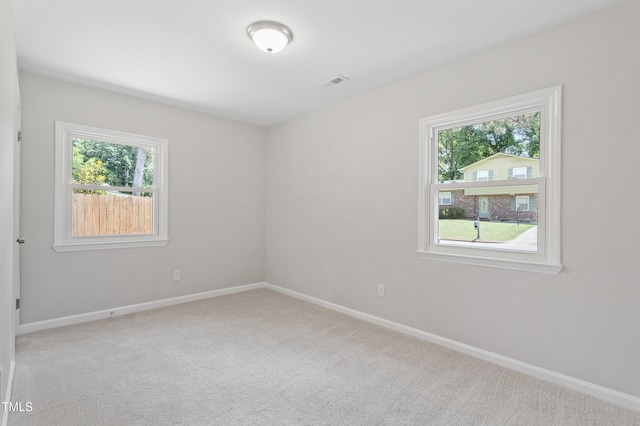 3204 Winfield Ct, Raleigh, NC 27610 - carpeted empty room featuring plenty of natural light and baseboards