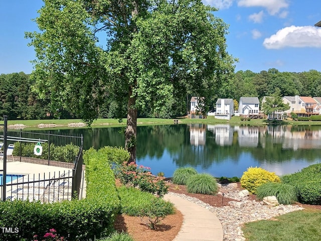 631 Springfork Dr, Cary, NC 27513 - view of community featuring a water view and a swimming pool