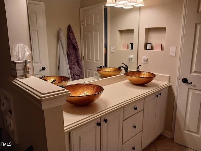 631 Springfork Dr, Cary, NC 27513 - bathroom featuring double vanity and tile patterned floors