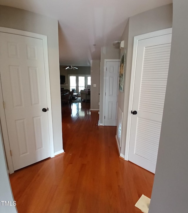 631 Springfork Dr, Cary, NC 27513 - corridor featuring wood finished floors and baseboards