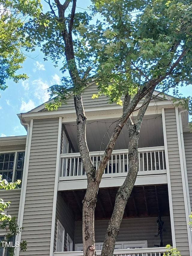 631 Springfork Dr, Cary, NC 27513 - view of side of property with a balcony