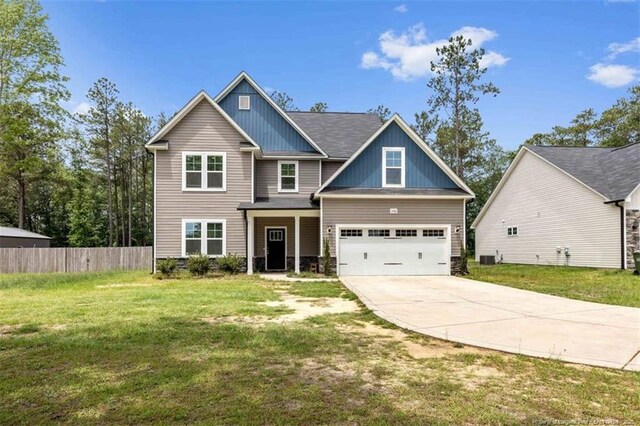 7680 Rufus Johnson Rd, Fayetteville, NC 28306 - craftsman inspired home with concrete driveway, board and batten siding, and a garage