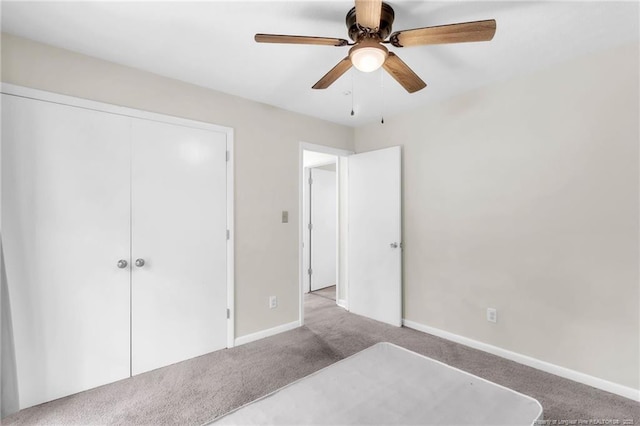 7076 Pantego Dr, Fayetteville, NC 28314 - unfurnished bedroom with carpet flooring, a closet, baseboards, and ceiling fan