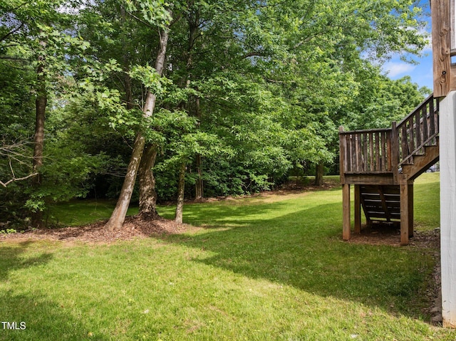 100 Silver Lining Ln, Cary, NC 27513 - view of green lawn featuring stairway and a wooden deck